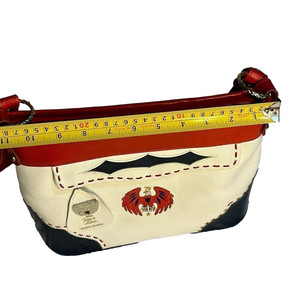 Miss Tony Lama Vintage Leather purse with strap.